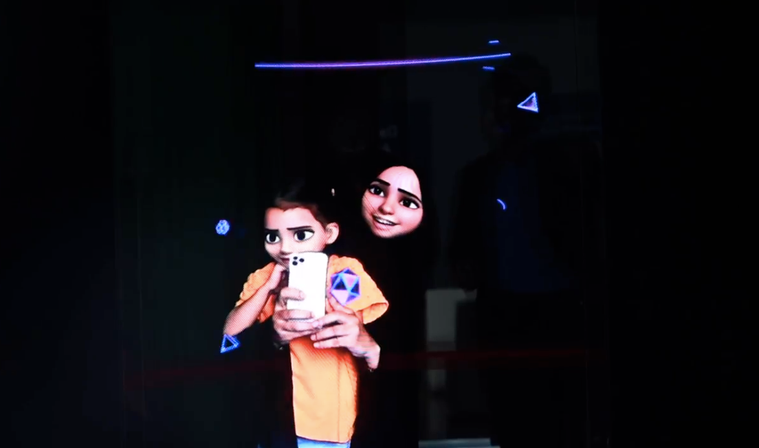 A young girl and a woman interact with a holographic display, where real-time engagement is enhanced through interactive holographic technology, reflecting their images with digital elements